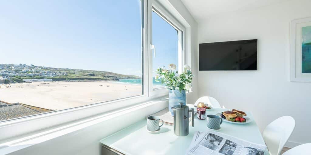 views of Porthmeor Beach and the sea from Glas Mor which is an on the beach apartment in St Ives