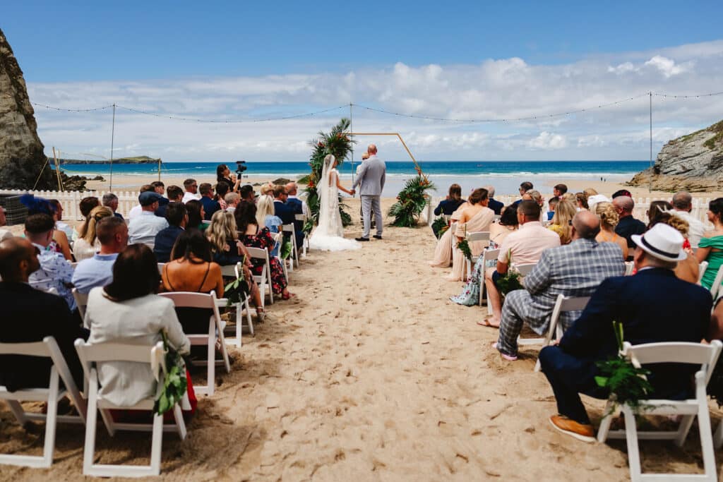 Couple getting married in Cornwall on Lusty Glaze Beach, Newquay